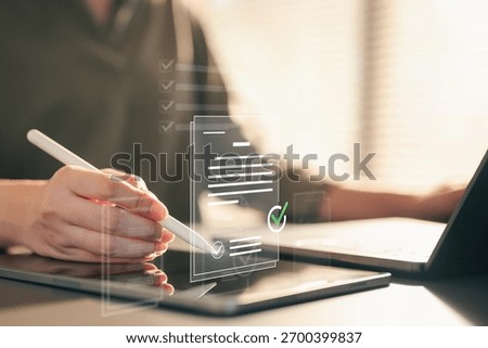 documents, checklist, audit, compliance, workflow, Close-up of a person using a stylus on a tablet with digital documents and checklists, symbolizing approval, validation, and workflow management.