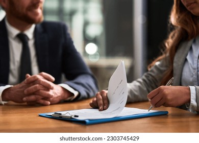 Documents, contract and business people writing signature for deal, partnership or legal paperwork in night office. Paper of lawyer woman, notary or partner hands for policy, compliance and agreement - Powered by Shutterstock