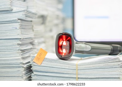 Documents Waiting To Read By Barcode Reader For Convert Data Into The Computer.