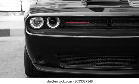 Dodge Charger front right headlight with grille and charger font red - Shutterstock ID 2033329148