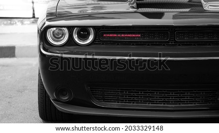 Dodge Charger front right headlight with grille and charger font red