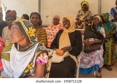 Dodoma, Tanzania. 10-10-2018. Group Of Black Muslim Woman In Tanzania Are Waiting To Receive Medical Assistance Sitting On A Bench In The Hospital In A Rural Area Of The Country.