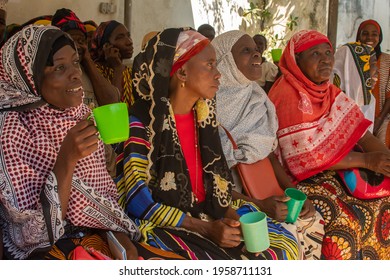 Dodoma, Tanzania. 10-10-2018. Group Of Black Muslim Woman In Tanzania Are Waiting To Receive Medical Assistance Sitting On A Bench In The Hospital In A Rural Area Of The Country.