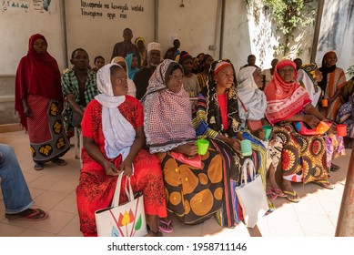 Dodoma, Tanzania. 10-10-2018. Group Of Black Muslim Woman In Tanzania Are Waiting To Receive Medical Assistance Sitting On A Bench In The Hospital In A Rural Area Of The Country.