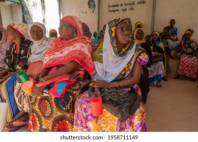 Dodoma, Tanzania. 10-10-2018. Group Of Black Muslim Woman In Tanzania Are Waiting To Receive Medical Assistance Sitting On A Bench In The Hospital In A Rural Area Of The Country.