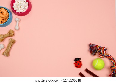 Dog Accessories, Food And Toy On Pink Background. Flat Lay. Top View.