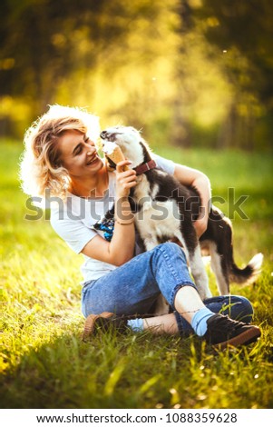 Similar – Foto Bild Glücklicher lächelnder Hund mit seinem hübschen jungen Besitzer