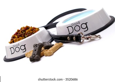 Dog Care Items, Isolated On White Background. Shallow Focus On Leash & Water Dish In Foreground.