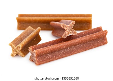 Dog chews for cleaning dog's teeth. Isolated on white background with natural shadow. With clipping path. Chewing dental dog treats. Titbit for shaggy pet. Helps to freshen dog's breath. 