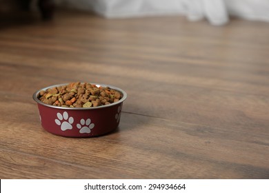 Dog Food In Bowl On Floor At Home