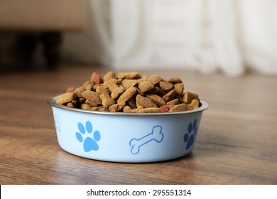 Dog Food In Bowl On Floor At Home