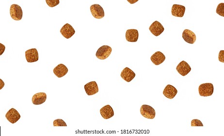 Dog food flying around poured in different directions on a white background.