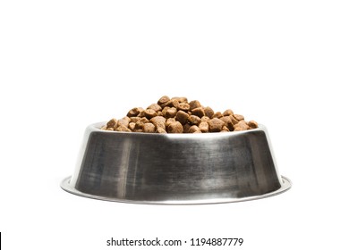 Dog Food In A Stainless Steel Bowl On A White Background With Copy Space