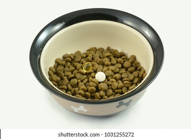 Dog Food Supplements Of Fish Oil And Glucosamine For Older Dogs With Arthritis And Dog Athletes For Joint Health Placed In Bowl Of Dog Food