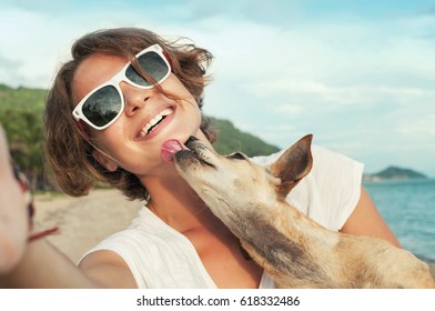 Dog Kisses His Owner