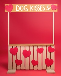 Dog Kissing Booth On An Isolated Background