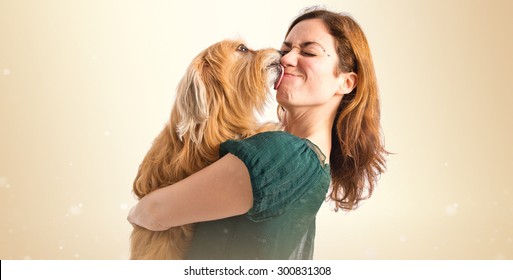 Dog Kissing Her Owner