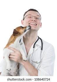 Dog Licking A Vet, Isolated On White. Veterinarian Is Holding Jack Russell Terrier