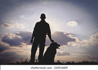 Dog And Man Silhouette
