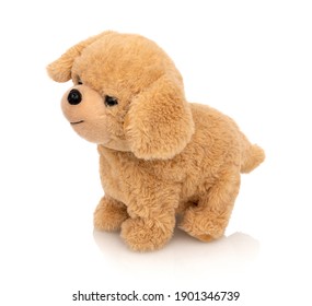 Dog Plushie Doll Isolated On White Background With Shadow Reflection. Playful Bright Brown Puppy Toy. Plush Stuffed Puppet On White Backdrop. Fluffy Toy For Children. Cute Furry Plaything For Kids.