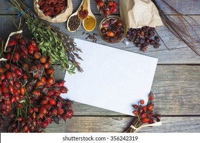 Dog rose, bunch branch Rosehips. Different types Rosa canina hips, dry goji berries, briar powder, Herbal tea. dry potions. on bagging fabric.  Paper room for text. selective focus, toned image - Shutterstock ID 356242319