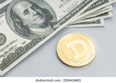 Dogecoin Coin And A Pile Of US Dollar Banknotes. Blockchain Money Versus Fiat Money Concept