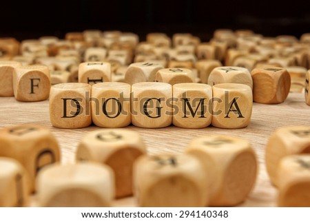 DOGMA word written on wood block