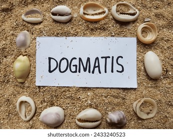 Dogmatis writting on beach sand background. - Powered by Shutterstock