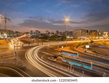 Doha, Qatar - 05 July 2020: Traffic At Sunset Time On Crazy Signal Bank Street Doha