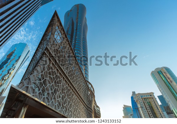 DOHA, QATAR -22 Nov 2018 - View of the\
modern Doha skyline on West Bay. The capital of Qatar includes many\
supertall highrise\
skyscrapers.