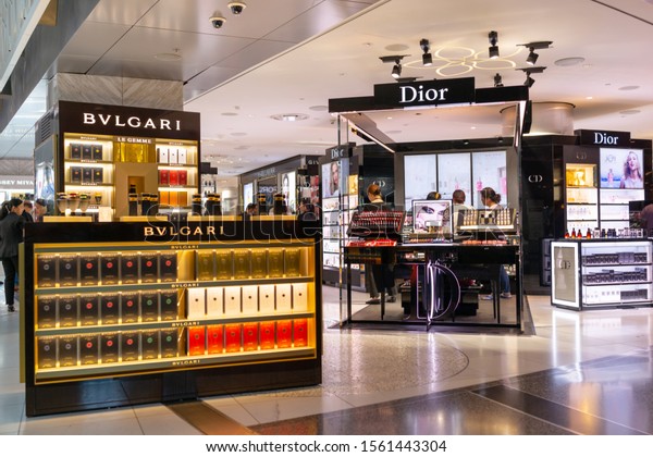 DOHA, QATAR - 31 OCT 2019: Interior of  Perfume\
and Cosmetics store in Hamad International Airport. Cosmetics are\
the most accessible product, with counters in upmarket stores\
across the world.
