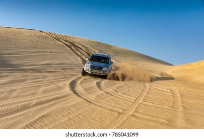 Doha, Qatar - April 1st 2017: Sand Dune Bashing In The Desert Of Qatar With A 4x4 Vehicle