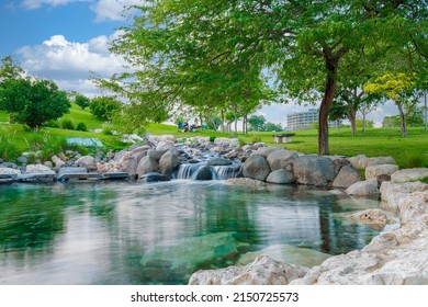 Doha, Qatar - April 27, 2022: Beautiful and green park in Katara Cultural Village, Katara Lake Hill
