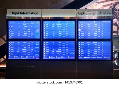 Doha, Qatar - April 4, 2019: Flight Information Display System In Hamad International Airport.