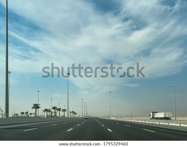 Doha, Qatar - August 08, 2020:\
Highways of Qatar Road Transportation Desert Middle\
East