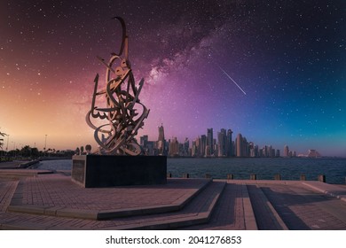 DOHA, QATAR - CIRCA, 2018: Night view of the calligraphy sculpture on the Doha corniche seaside promenade. This calligraphy was made by british artist Sabah Arbilli.