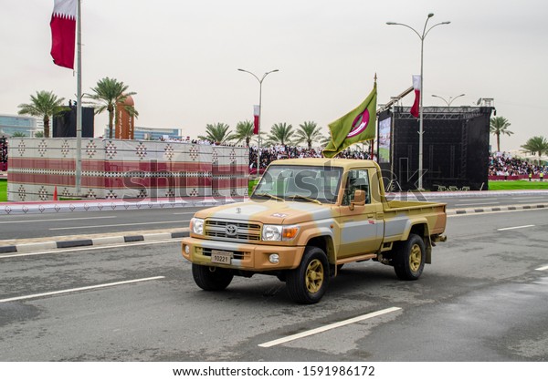 DOHA, QATAR - DEC 18 2019: Qatar National Day is\
a national commemoration of Qatar\'s unification in 1878. It\'s\
celebrated annually on 18 December. Taken on the 18th December\
2019, national day\
parade.