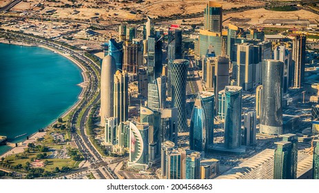 DOHA, QATAR - DECEMBER 12, 2016: Aerial View Of City Skyline. Doha Is A Fast Growing Business Center In Middle East.