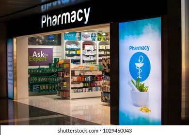 Doha, Qatar - December 2017: Pharmacy store on airport in Doha. Popular drugstore beauty inside. Eucerin, Uriage, Caudalie. Front view, exterior, shop window.