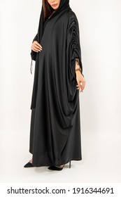 Doha, Qatar - February 10, 2021: Traditional Arabic Muslim woman in stylish abaya. Arab fashionable abaya