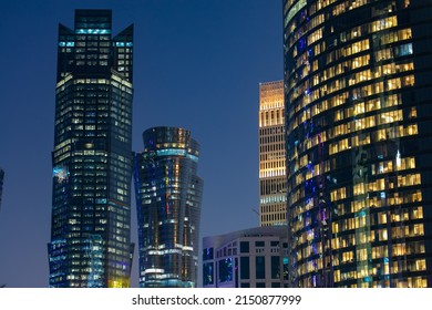 Doha, Qatar - February 22, 2022: Banks, offices and ministries and modern towers of Doha skyline reflecting in Doha Downtown. Cityscape of West Bay district.