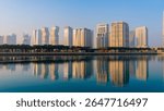 Doha, Qatar -February 24, 2025: A foggy morning in Doha with skyscrapers partially hidden in mist, creating a mysterious and serene cityscape.