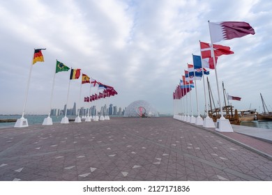DOHA, QATAR - JAN 20, 2022: Flags of nations qualified for World Cup Qatar 2022 hoisted at Doha Corniche, Qatar, Middle East.