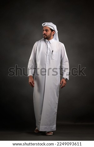 Doha, Qatar - January 12, 2023: Portrait of Qatari men in traditional dress.