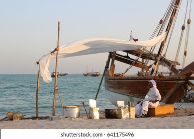 Doha  / Qatar – November, 2014:  An Old Man Selling Local Food Near The Beach Of Doha During A Traditional Festival / Qatari Traditional Food Seller 