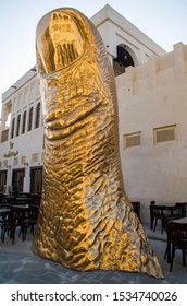 Doha, Qatar - OCT 18 2019: 'Le Pouce', A Sculpture In The Shape Of A Giant Thumb, Art Piece By Acclaimed French Artist César Baldaccini At Souq Waqif.