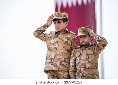 Doha,Qatar,12,18,2019. Qatari children dressed in traditional and military clothes for national day.