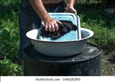 Doing Laundry By Hand Outside Old Style  Closeup Man Hands Russian Washboard Housework Watter Village Dirty