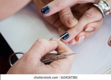 Doing Nails By An Nail Stylist