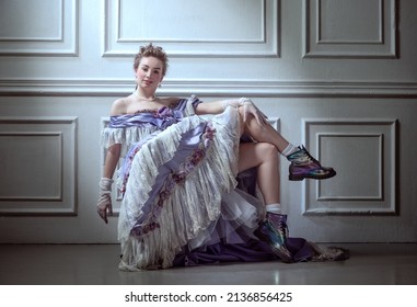 Dolce Far Niente. Cinematic Portrait Of Young Pretty Girl In Image Of Medieval Royal Person In Renaissance Style Attire Isolated On Dark Background. Comparison Of Eras, Painting, History, Creativity.